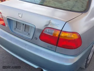 1999 Honda Civic EX with VIN 2HGEJ8640XH505636, listed as a IAAI auction lot 41629850 with 369,637 mi miles. Bid and sale history available at carsss.com. Image 6.