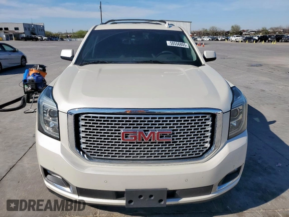 2015 GMC Yukon Denali z VIN 1GKS2CKJ6FR706151, wystawiony jako Copart lot #50556805 z przebiegiem 174 259 mil mil oraz Czysty tytuł • Clean title. Historia ofert i sprzedaży dostępna na DreamBid. Obrazek 5.