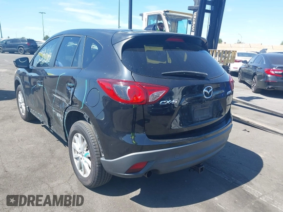2013 Mazda CX-5 Touring with VIN JM3KE2CEXD0153589, listed as a IAAI auction lot 41855356 with 86,030 mi miles and . Bid and sale history available at DreamBid. Image 14.