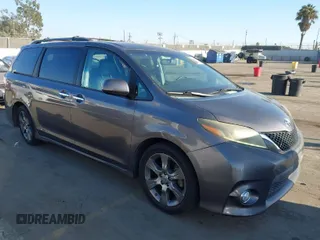 2015 Toyota Sienna SE with VIN 5TDXK3DC9FS551094, listed as a IAAI auction lot 41676903 with 94,345 mi miles. Bid and sale history available at carsss.com. Image 1.