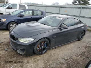 2015 BMW M4 with VIN WBS3R9C56FF708654, listed as a Copart auction lot 40082774 with 82,713 mi miles and Clean Title. Bid and sale history available at carsss.com. Image 1.
