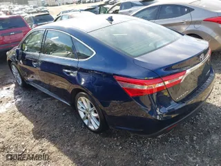 2013 Toyota Avalon XLE with VIN 4T1BK1EB7DU041688, listed as a IAAI auction lot 41869635 with 144,980 mi miles. Bid and sale history available at carsss.com. Image 3.