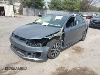 2013 Volkswagen Jetta Autobahn with VIN 3VW4T7AJ7DM451077, listed as a IAAI auction lot 41855053 with 75,207 mi miles and . Bid and sale history available at DreamBid. Image 2.