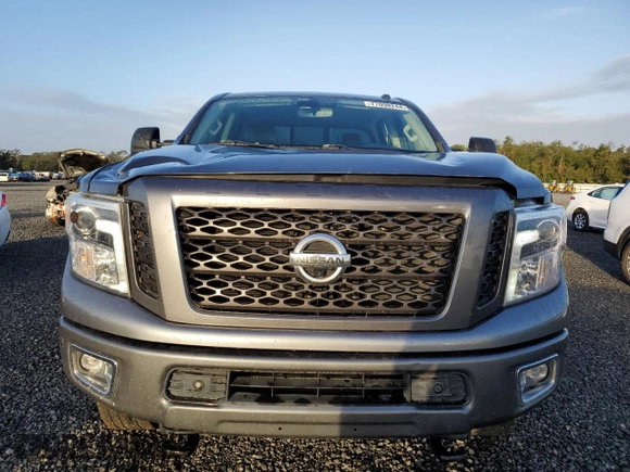 2019 Nissan Titan XD SV with VIN 1N6BA1F4XKN532266, listed as a Copart auction lot 77098244 with 105,965 mi miles and Salvage Title. Bid and sale history available at carsss.com. Image 5.