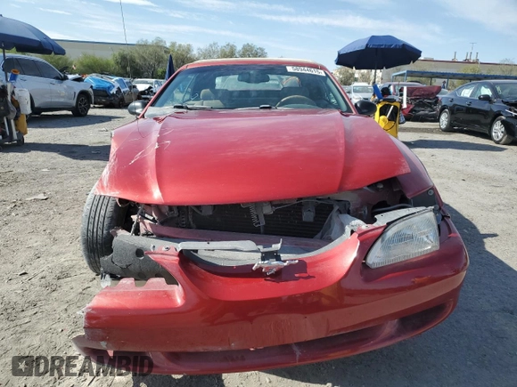 1998 Ford Mustang z VIN 1FAFP4440WF258072, wystawiony jako Copart lot #58944615 z przebiegiem 125 984 mil mil oraz Szkoda całkowita • Salvage title. Historia ofert i sprzedaży dostępna na DreamBid. Obrazek 5.