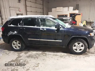 2011 Jeep Grand Cherokee Laredo with VIN 1J4RR4GG3BC640075, listed as a IAAI auction lot 41712754 with 190,199 mi miles. Bid and sale history available at carsss.com. Image 13.