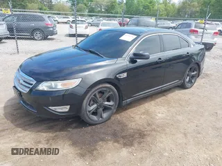2012 Ford Taurus SHO z VIN 1FAHP2KT6CG143490, wystawiony jako IAAI lot #42235776 z przebiegiem 125 671 mil mil oraz . Historia ofert i sprzedaży dostępna na DreamBid. Obrazek 2.