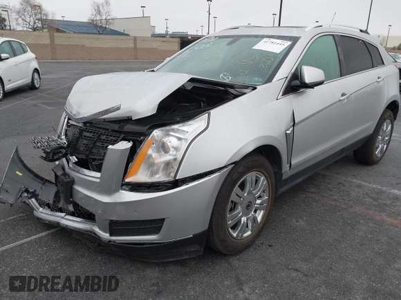 2016 Cadillac SRX Luxury Collection z VIN 3GYFNBE38GS520891, wystawiony jako IAAI lot #41781445 z przebiegiem 52 202 mil mil oraz . Historia ofert i sprzedaży dostępna na DreamBid. Obrazek 2.