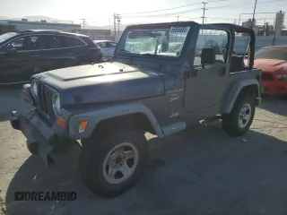 2001 Jeep Wrangler Sport z VIN 1J4FA49S71P325220, wystawiony jako Copart lot #56956685 z przebiegiem 129 377 mil mil oraz Szkoda całkowita • Salvage title. Historia ofert i sprzedaży dostępna na DreamBid. Obrazek 1.