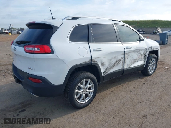 2016 Jeep Cherokee Latitude with VIN 1C4PJMCS1GW185442, listed as a IAAI auction lot 42033699 with 123,306 mi miles. Bid and sale history available at carsss.com. Image 4.