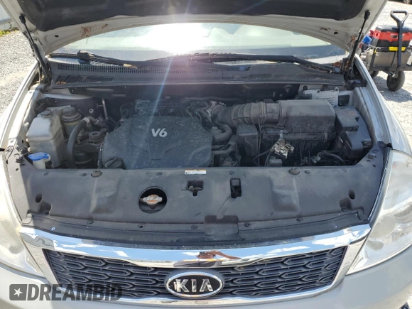 2012 Kia Sedona EX with VIN KNDMH4C73C6486976, listed as a Copart auction lot 55849525 with 215,427 mi miles and Clean Title. Bid and sale history available at DreamBid. Image 12.
