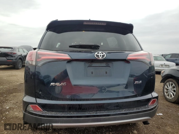 2017 Toyota RAV4 XLE with VIN JTMWFREV3HD102091, listed as a Copart auction lot 53815795 with 49,627 mi miles and Salvage Title. Bid and sale history available at DreamBid. Image 6.