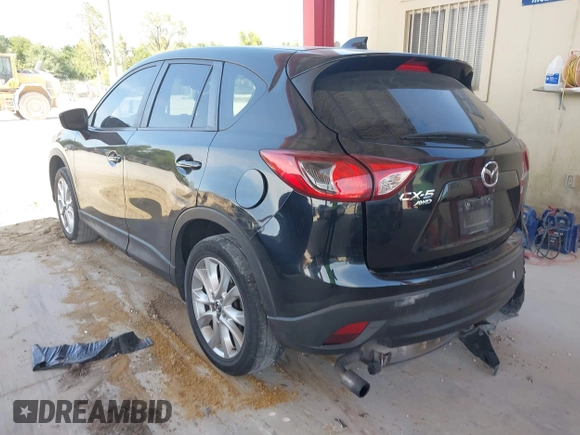 2015 Mazda CX-5 Grand Touring with VIN JM3KE4DY7F0481883, listed as a IAAI auction lot 42091709 with 184,248 mi miles and . Bid and sale history available at DreamBid. Image 3.