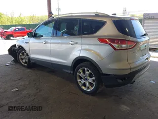 2016 Ford Escape Titanium с VIN 1FMCU9JX3GUB75889, выставлен на аукционе IAAI как лот 42188565 с пробегом 121 638 миль миль и . История ставок и продаж доступна на DreamBid. Изображение 3.