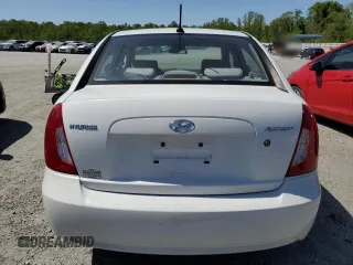 2011 Hyundai Accent GLS z VIN KMHCN4AC6BU614007, wystawiony jako Copart lot #53607545 z przebiegiem 138 593 mil mil oraz Szkoda całkowita • Salvage title. Historia ofert i sprzedaży dostępna na DreamBid. Obrazek 6.
