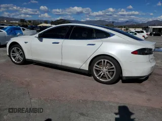 2013 Tesla Model S with VIN 5YJSA1CGXDFP21051, listed as a Copart auction lot 48377775 with 125,472 mi miles and Salvage Title. Bid and sale history available at carsss.com. Image 2.