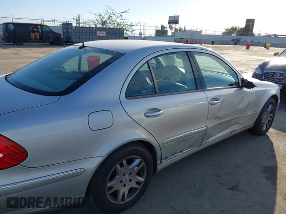 2005 Mercedes-Benz E-Class 3.2L with VIN WDBUF65JX5A718711, listed as a IAAI auction lot 41625603 with 145,024 mi miles. Bid and sale history available at carsss.com. Image 6.