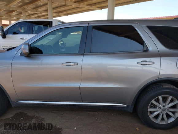 2015 Dodge Durango SXT z VIN 1C4RDJAG7FC240103, wystawiony jako IAAI lot #42621514 z przebiegiem 197 257 mil mil oraz . Historia ofert i sprzedaży dostępna na DreamBid. Obrazek 14.