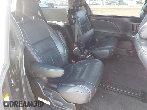 2015 Toyota Sienna SE with VIN 5TDXK3DC8FS633124, listed as a IAAI auction lot 41475935 with 182,921 mi miles and . Bid and sale history available at DreamBid. Image 8.