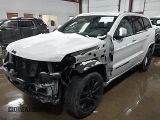 2020 Jeep Grand Cherokee Altitude with VIN 1C4RJFAG2LC209665, listed as a IAAI auction lot 41323712 with 66,194 mi miles. Bid and sale history available at carsss.com. Image 2.