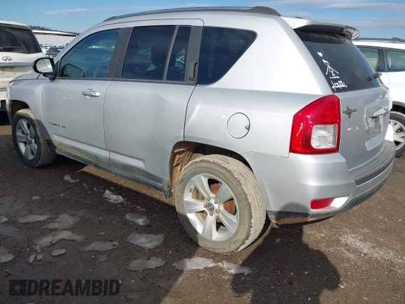 2011 Jeep Compass with VIN 1J4NT1FB4BD252724, listed as a IAAI auction lot 41247389 with 162,028 mi miles. Bid and sale history available at carsss.com. Image 3.