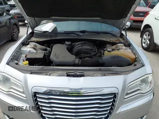 2012 Chrysler 300 Limited with VIN 2C3CCACG9CH223032, listed as a IAAI auction lot 42144147 with 139,625 mi miles. Bid and sale history available at carsss.com. Image 10.