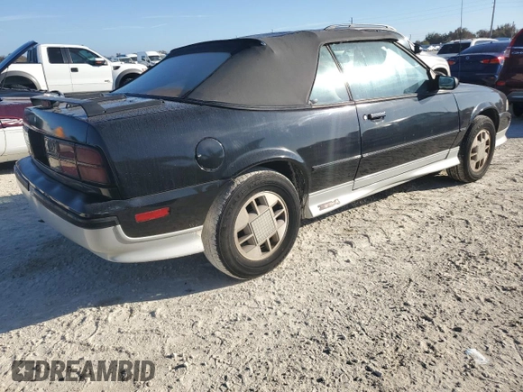 1989 Chevrolet Cavalier with VIN 1G1JF31W1K7190840, listed as a Copart auction lot 77747934 with Not Provided miles and Salvage Title. Bid and sale history available at DreamBid. Image 3.