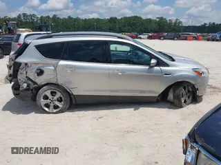 2014 Ford Escape SE with VIN 1FMCU9G9XEUD91390, listed as a IAAI auction lot 42561849 with 319,400 mi miles and . Bid and sale history available at DreamBid. Image 14.