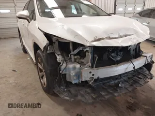 2018 Lexus RX 350 z VIN 2T2BZMCA5JC144530, wystawiony jako IAAI lot #41417396 z przebiegiem 97 860 mil mil oraz . Historia ofert i sprzedaży dostępna na DreamBid. Obrazek 17.