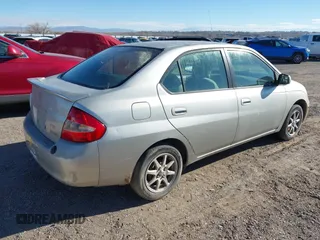 2003 Toyota Prius with VIN JT2BK18U330071125, listed as a IAAI auction lot 41345793 with 230,618 mi miles. Bid and sale history available at carsss.com. Image 4.