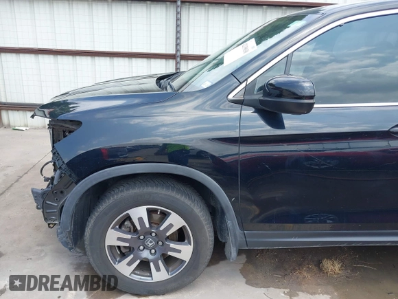 2017 Honda Ridgeline RTL z VIN 5FPYK2F55HB011463, wystawiony jako IAAI lot #42139030 z przebiegiem 59 066 mil mil oraz . Historia ofert i sprzedaży dostępna na DreamBid. Obrazek 19.