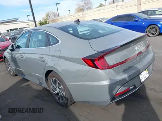 2022 Hyundai Sonata Hybrid Blue with VIN KMHL24JJ5NA037502, listed as a IAAI auction lot 40975379 with 69,018 mi miles. Bid and sale history available at carsss.com. Image 15.