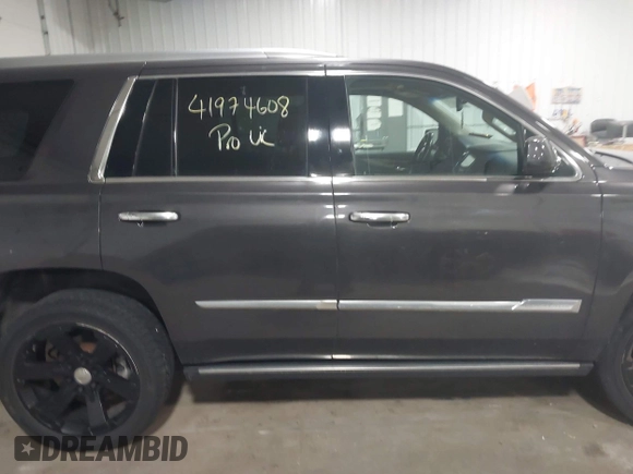 2015 Cadillac Escalade Premium with VIN 1GYS4CKJ8FR308617, listed as a IAAI auction lot 41974608 with 154,014 mi miles and . Bid and sale history available at DreamBid. Image 13.