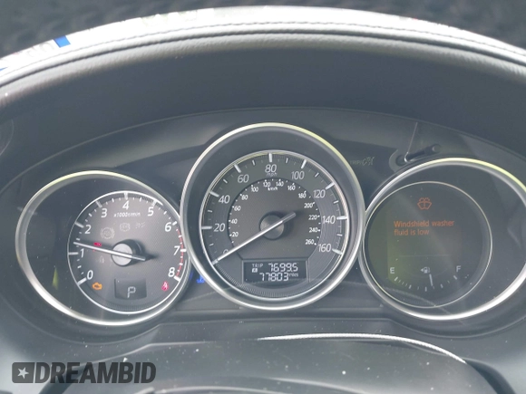 2016 Mazda 6 i Grand Touring z VIN JM1GJ1W58G1486694, wystawiony jako IAAI lot #42094443 z przebiegiem 77 803 mil mil oraz . Historia ofert i sprzedaży dostępna na DreamBid. Obrazek 7.