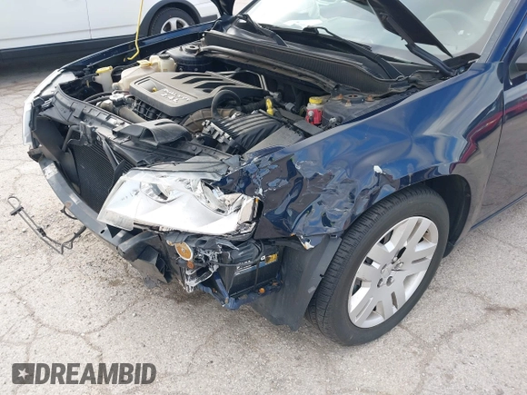 2014 Dodge Avenger SE with VIN 1C3CDZAB1EN111015, listed as a IAAI auction lot 42330669 with 82,265 mi miles and . Bid and sale history available at DreamBid. Image 6.