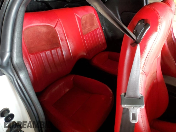 2001 Chevrolet Camaro Z28 z VIN 2G1FP22G612106148, wystawiony jako Copart lot #51154555 z przebiegiem 81 209 mil mil oraz Szkoda całkowita • Salvage title. Historia ofert i sprzedaży dostępna na DreamBid. Obrazek 10.