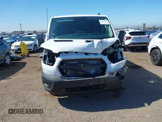 2021 Ford Transit with VIN 1FTBR1YG6MKA39997, listed as a IAAI auction lot 42228463 with 38,559 mi miles and . Bid and sale history available at DreamBid. Image 13.