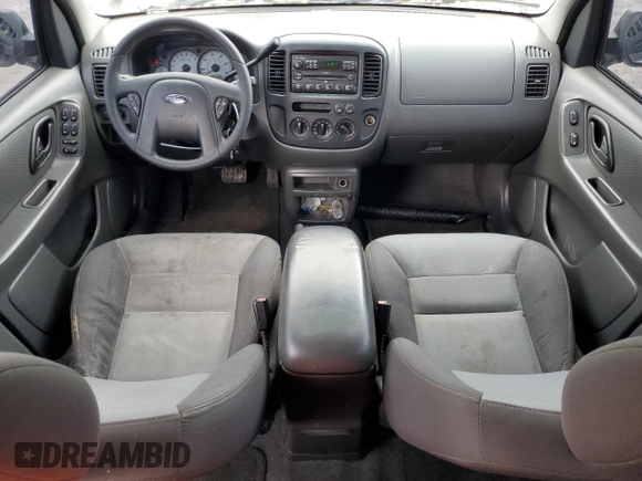 2004 Ford Escape XLS with VIN 1FMYU02144DA18217, listed as a Copart auction lot 43136895 with 135,424 mi miles and Salvage Title. Bid and sale history available at DreamBid. Image 8.