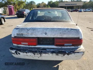 1995 Buick Regal Custom с VIN 2G4WB52M5S1425279, выставлен на аукционе Copart как лот 80939374 с пробегом 151 906 миль миль и Списание • Salvage title. История ставок и продаж доступна на DreamBid. Изображение 6.