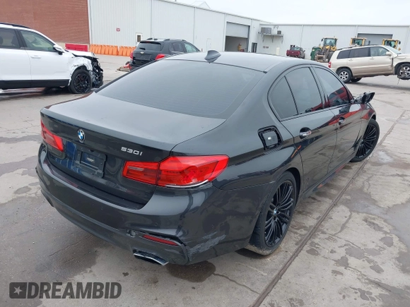 2018 BMW 5 Series 530i with VIN WBAJA5C58JWA39567, listed as a IAAI auction lot 41707627 with Not Provided miles and . Bid and sale history available at DreamBid. Image 4.