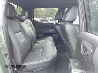 2021 Toyota Tacoma SR with VIN 3TMCZ5AN5MM380286, listed as a IAAI auction lot 42165523 with 58,965 mi miles and . Bid and sale history available at DreamBid. Image 8.
