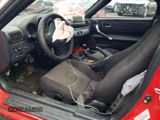 2000 Toyota MR2 z VIN JTDFR320XY0021688, wystawiony jako Copart lot #88487765 z przebiegiem 163 114 mil mil oraz Szkody całkowita. Historia ofert i sprzedaży dostępna na DreamBid. Obrazek 7.