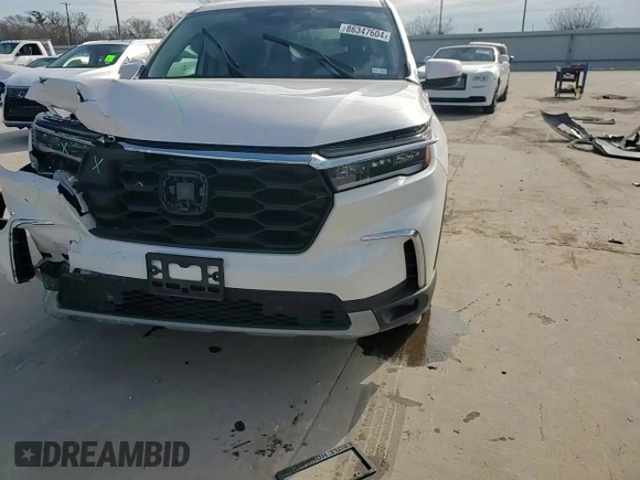 2023 Honda Pilot EX-L 8 Passenger with VIN 5FNYG2H46PB008987, listed as a Copart auction lot 86347604 with 12,321 mi miles and Salvage Title. Bid and sale history available at carsss.com. Image 12.