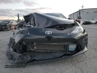 2017 Toyota 86 with VIN JF1ZNAA15H9710207, listed as a Copart auction lot 87501915 with 68,738 mi miles and Salvage Title. Bid and sale history available at carsss.com. Image 5.