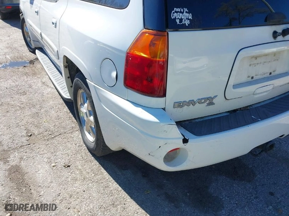 2003 GMC Envoy XL SLT with VIN 1GKET16S136145209, listed as a IAAI auction lot 40862083 with 244,923 mi miles. Bid and sale history available at carsss.com. Image 6.
