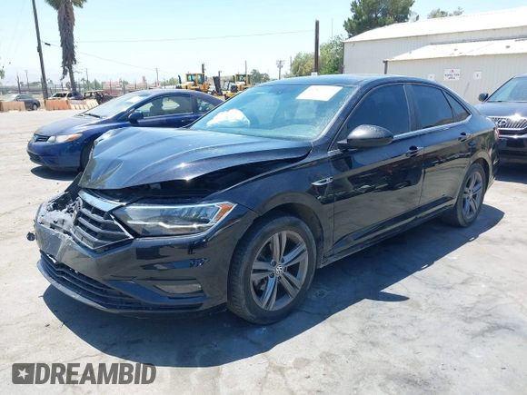 2019 Volkswagen Jetta S z VIN 3VWC57BU1KM116991, wystawiony jako IAAI lot #42377777 z przebiegiem 70 910 mil mil oraz . Historia ofert i sprzedaży dostępna na DreamBid. Obrazek 2.