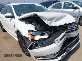 2014 Volkswagen Passat SE z VIN 1VWBN7A3XEC068708, wystawiony jako IAAI lot #42439517 z przebiegiem 144 563 mil mil oraz . Historia ofert i sprzedaży dostępna na DreamBid. Obrazek 6.