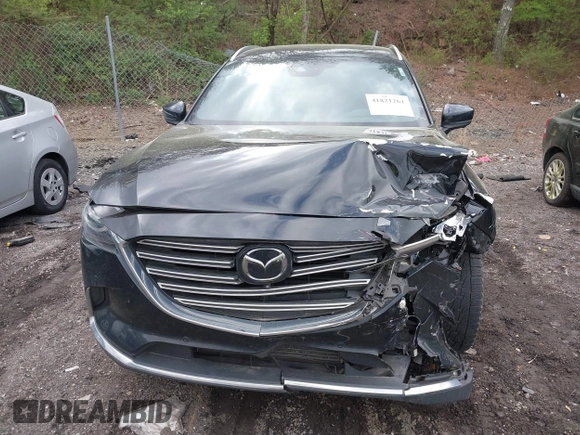 2021 Mazda CX-9 Carbon Edition with VIN JM3TCADY4M0517535, listed as a IAAI auction lot 41821261 with 60,053 mi miles. Bid and sale history available at carsss.com. Image 12.