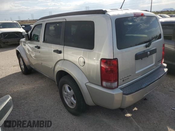 2009 Dodge Nitro SE z VIN 1D8GT28K29W504908, wystawiony jako Copart lot #75272154 z przebiegiem 156 571 mil mil oraz Szkoda całkowita • Salvage title. Historia ofert i sprzedaży dostępna na DreamBid. Obrazek 2.