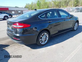 2019 Ford Fusion SEL with VIN 3FA6P0MU6KR252797, listed as a IAAI auction lot 41994504 with 106,029 mi miles and . Bid and sale history available at DreamBid. Image 4.
